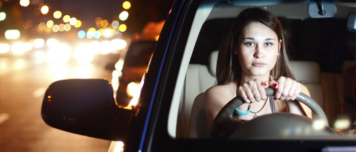 Women driving at night